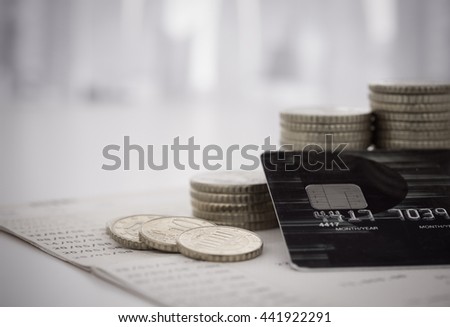 personal loan finance concept. credit card with coins pile on passbook banking. Royalty-Free Stock Photo #441922291