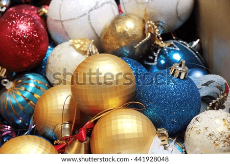 packing box with colorful festive Christmas decorations