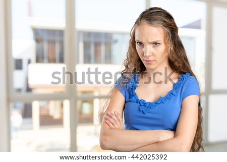 annoyed woman with crossed arms