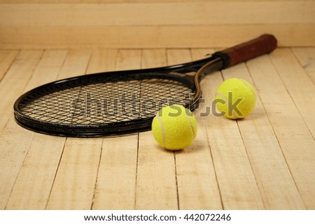 tennis ball on wooden background