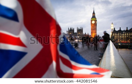 British union jack flag and Big Ben Clock Tower and Parliament house at city of westminster in the background - UK votes to leave the EU Royalty-Free Stock Photo #442081546