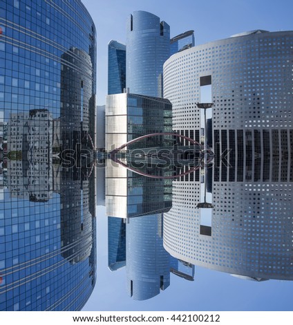 Abstract mirror effect skyscrapers with glass facade. Modern buildings in Paris business district. Concepts of economics, financial, future. Copy space for text.