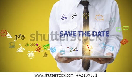 businessman holding a tablet computer with SAVE THE DATE   text ,business analysis and strategy as concept