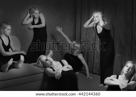 Young woman with split personality. Personal Bipolar disorder. A lot of girls in the same room. Woman goes crazy Royalty-Free Stock Photo #442144360