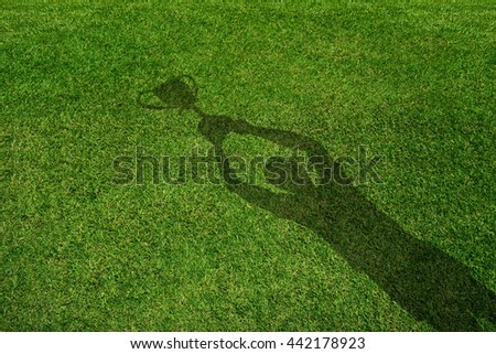 Yard Field with Male lift the Trophy Shadow