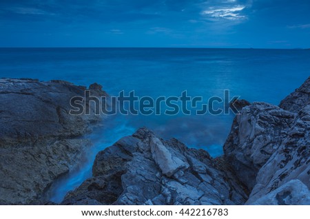 Razanj Croatia Europe. Seascape, landscape and nature. Reef, rock, stone and ocean in beautiful colors at warm summer evening. Long exposure fine art photo. Calm, relaxing and peaceful picture.