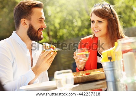 Picture of young couple in restaurant