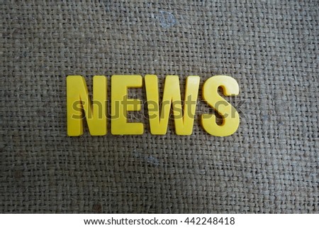 News concept. Yellow letters on background