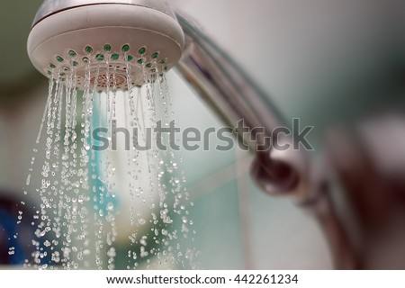 Shower with running water Royalty-Free Stock Photo #442261234
