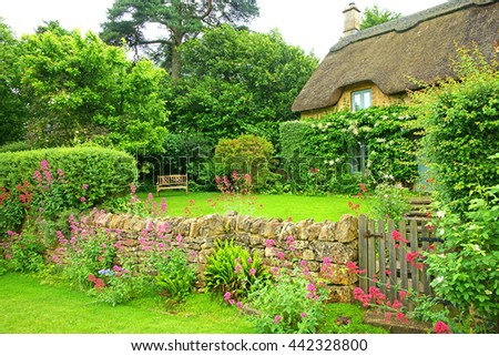 A Cotswold country garden in Summer time, Gloucestershire, England, UK