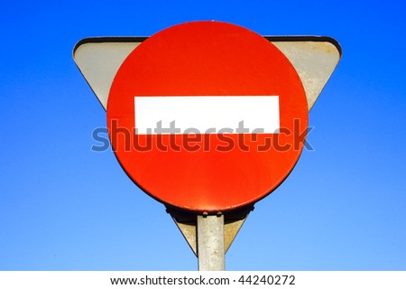 No entry traffic sign on a blue sky