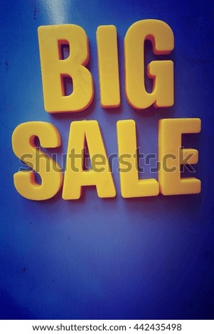 Sale concept. Yellow letters on blue background