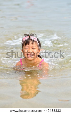 Girls enjoy sea bathing