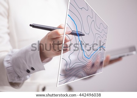Geographic information systems concept, woman scientist working with futuristic GIS interface on a transparent screen. Royalty-Free Stock Photo #442496038