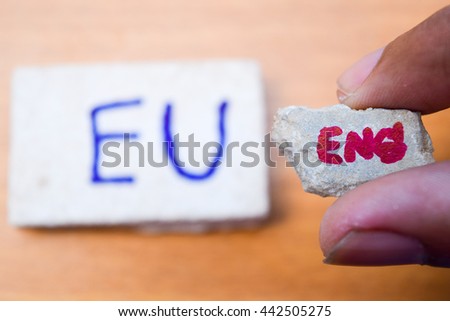 Brexit UK EU referendum concept with word UN and Eng on stone wall