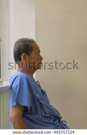 Patient elderly waiting a doctor and nurse in hospital