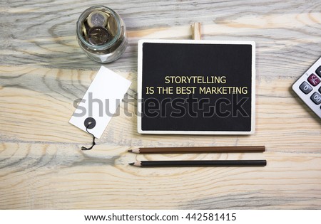 sentence Storytelling is the best Marketing, written with chalk on a blackboard, on a table with pen.The motivational quote Storytelling is the best Marketing. Royalty-Free Stock Photo #442581415
