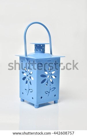 blue decorative lamp on white background