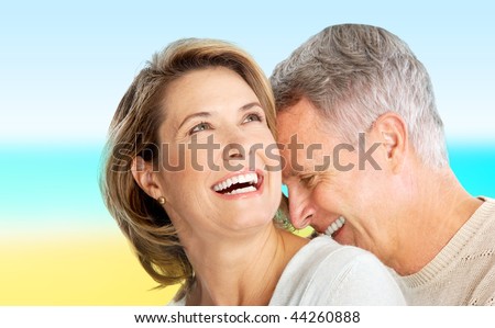 Happy elderly seniors couple in love outdoor