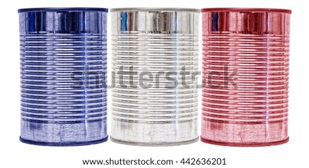 Three tin cans with the flag of France on them isolated on a white background.