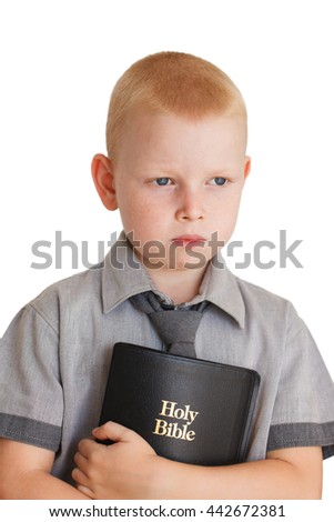 Casually Dressed Christian Boy Holding Holy Bible. High quality picture