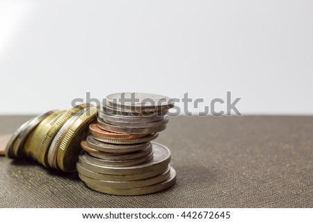 the falling of stack of coins ,Piles of coins