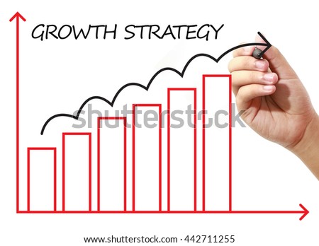 Businessman drawing GROWTH STRATEGY Graph on virtual screen. Business, banking, finance and investment concept.