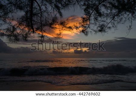 The sun set view with big wave at Nang Thong beach in Khao Lak, Thailand.