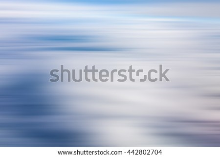 Blue and white horizontal motion blur texture for background