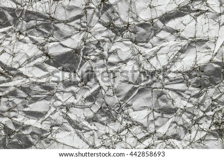 abstract silver wrinkled paper texture background