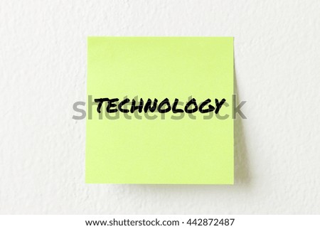 Yellow note paper with words Technology on the white wall