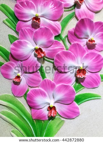 Low relief cement Thai style handcraft of orchid