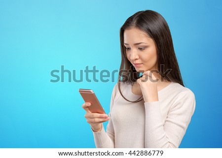 pretty female teenager using smartphone 