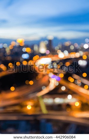 Blurred lights intersection overpass highway with blue sky background