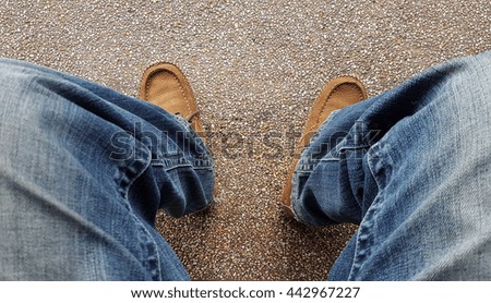 sitting someone on old grey cement background