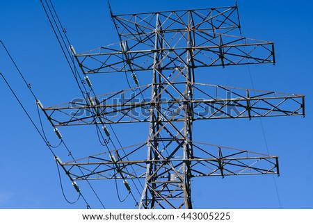 Electric Post and Wires in the Background of Blue Sky
