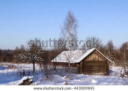 House in a village in a winter day