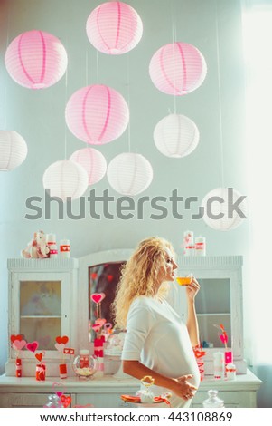 Pregnant woman resting after photo shoot