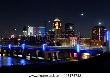 The skyline of the city of Des Moines lights up after dark. This night the Financial Center was lit up in rainbow colors in tribute of the Orlando mass shooting.