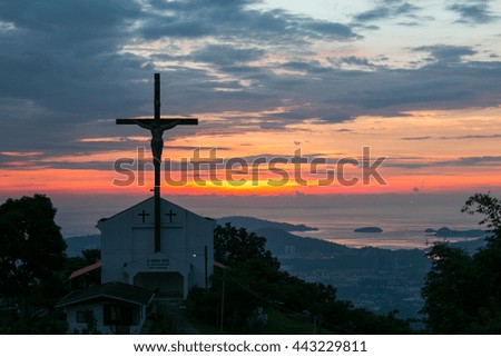 Silhouette Jesus and the cross over sunset Twilight 