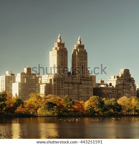 Skyline with apartment skyscrapers over lake in Central Park in midtown Manhattan in New York City