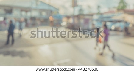 blurred image of shopping mall and people for background usage.