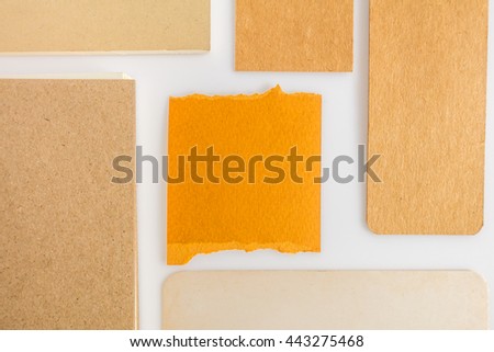 Collection of various paper, cardboard, tag, card and book with soft shadows.