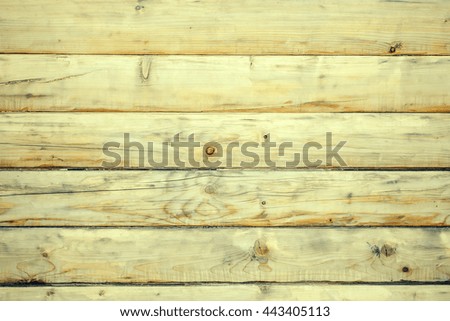 Wooden wall from logs as background texture