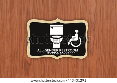 All Gender Restroom Sign Wood Grain Door Close Up