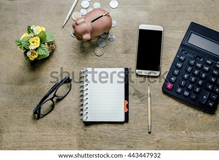 note book with  pencil and office equipment on desktop