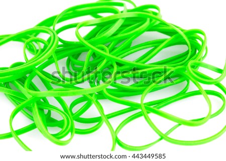 Green rubber bands closeup picture.