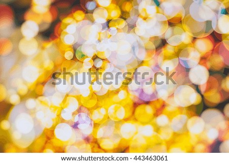 abstract blurred of blue and silver glittering shine bulbs lights background:blur of Christmas wallpaper decorations
