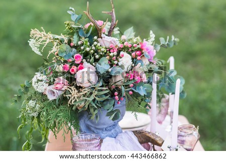 Wedding decor, floral arrangement, catering services, served table decorated for a photo session.