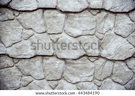The texture of the stone wall. Background